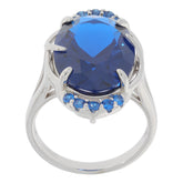 Oval blue sapphire sterling silver ring with accent stones, showcasing exquisite brilliance and elegance.